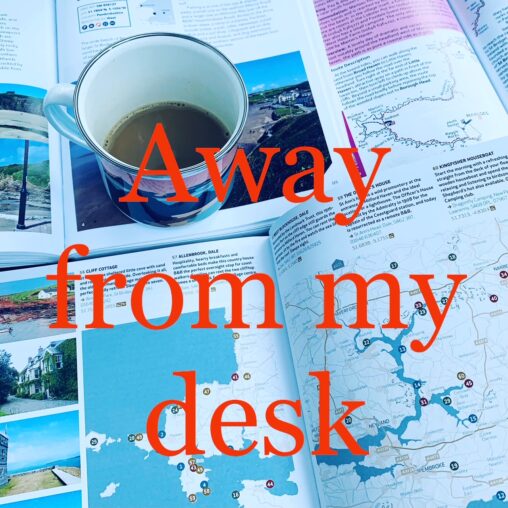 Maps and a cup of coffee with the words \